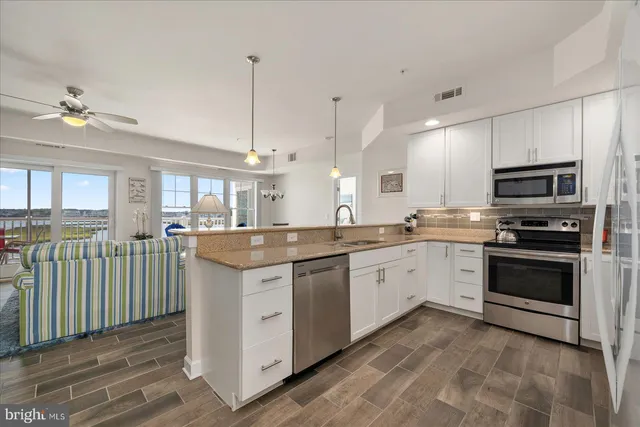 a work room with furniture and windows