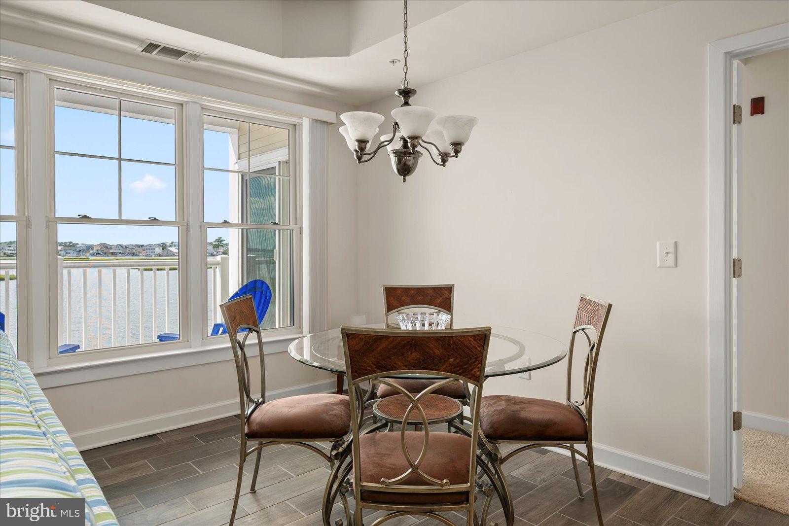 37292 Lighthouse Road, Unit 202 Selbyville, DE 19975 - Photo 24 of 78 a work room with furniture and windows