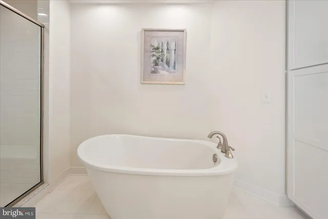 a view of a lake with houses in the back