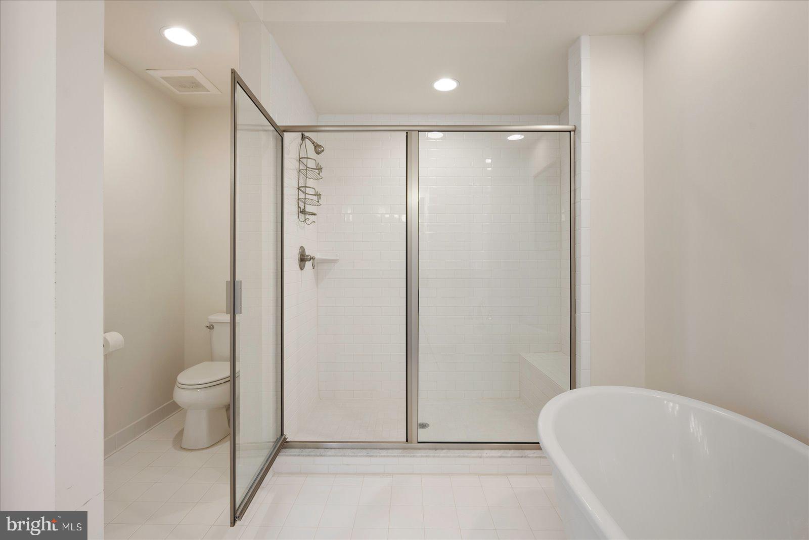 37292 Lighthouse Road, Unit 202 Selbyville, DE 19975 - Photo 37 of 78 a bathroom with a shower a toilet and a shower