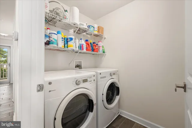 an aerial view of residential houses with lake view