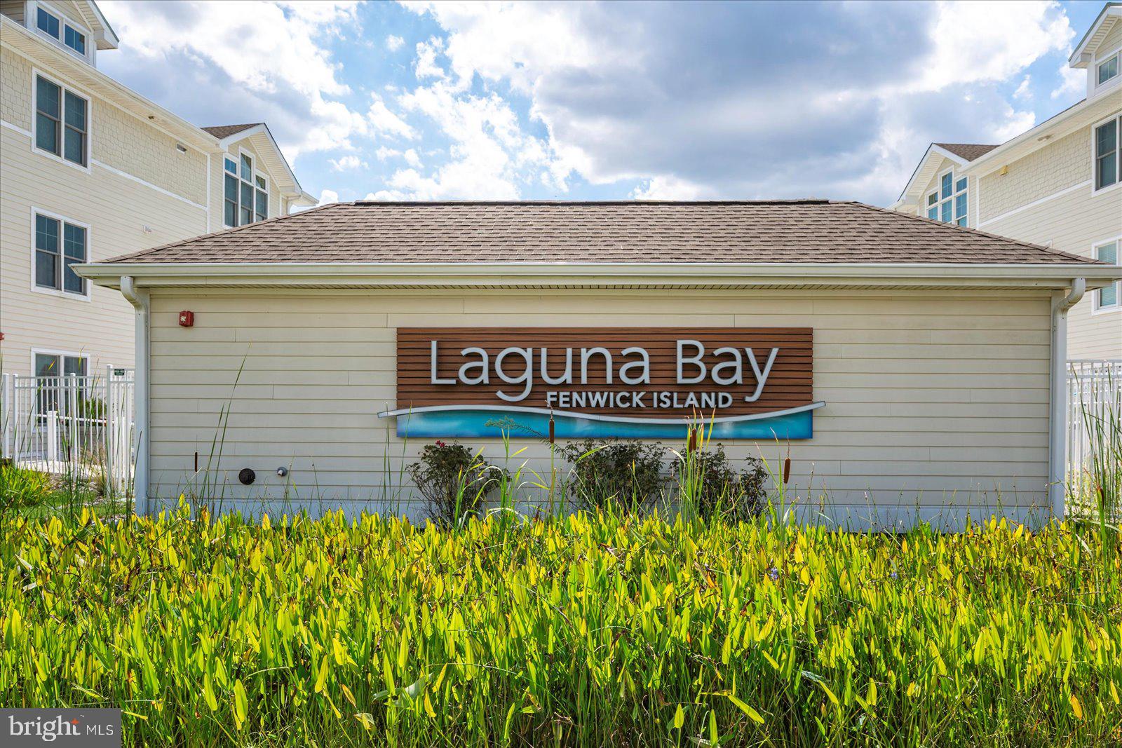 37292 Lighthouse Road, Unit 202 Selbyville, DE 19975 - Photo 59 of 78 a sign on the side of a building