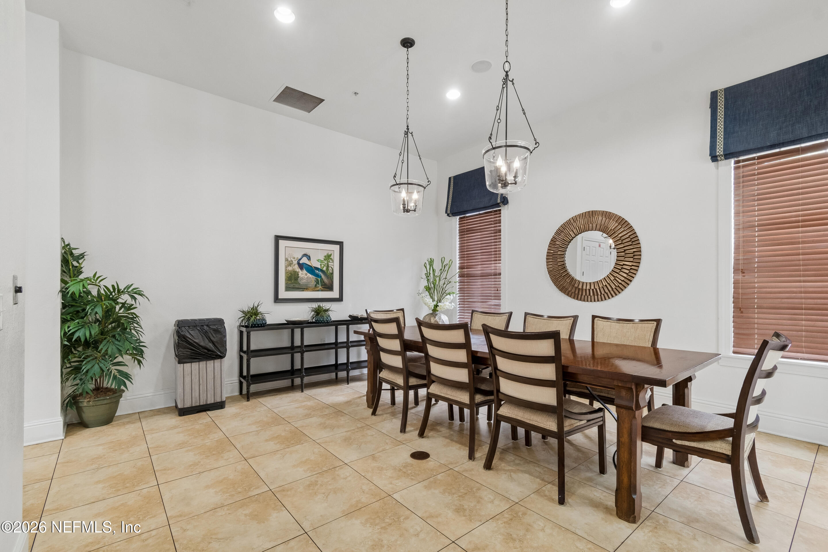 8550 Touchton Road, Unit 511 Jacksonville, FL 32216 - Photo 54 of 63 a dining room with furniture and a window