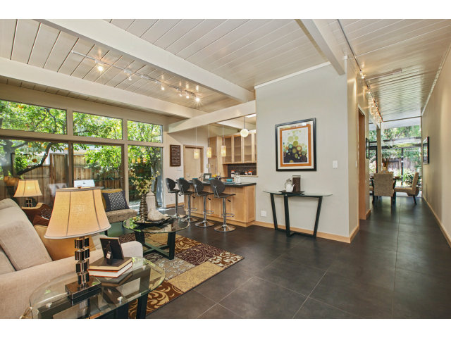 3390 Greer Road Palo Alto, CA 94303 - Photo 1 of 25 a living room with furniture and a large window