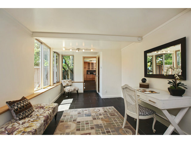 3390 Greer Road Palo Alto, CA 94303 - Photo 11 of 25 a living room with furniture and a large window