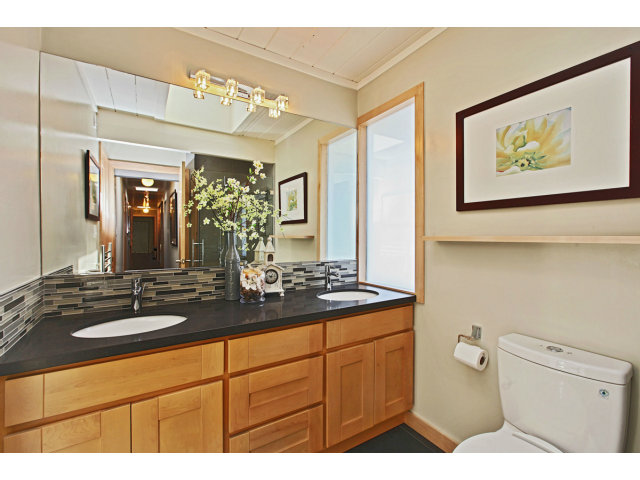 3390 Greer Road Palo Alto, CA 94303 - Photo 14 of 25 a bathroom with a toilet a sink and mirror