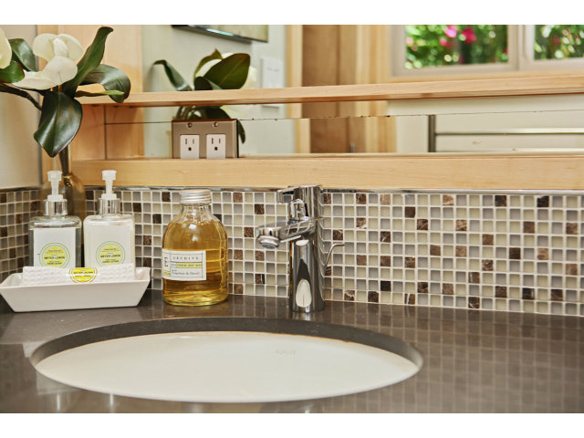 3390 Greer Road Palo Alto, CA 94303 - Photo 15 of 25 a bathroom with a sink and a mirror