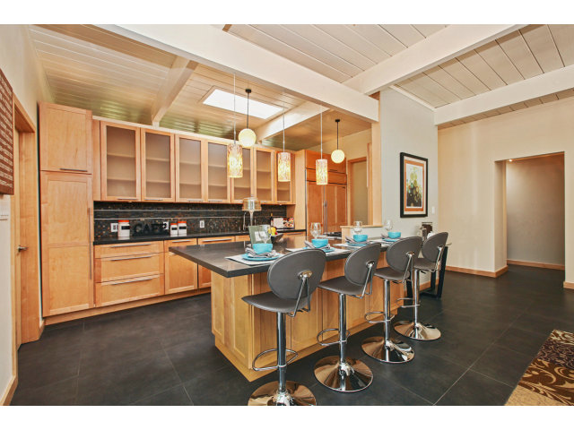 3390 Greer Road Palo Alto, CA 94303 - Photo 5 of 25 a kitchen with stainless steel appliances granite countertop a stove a sink and a refrigerator