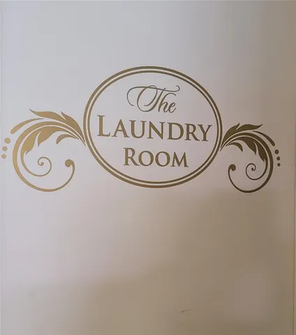 a sign that is sitting in a forest