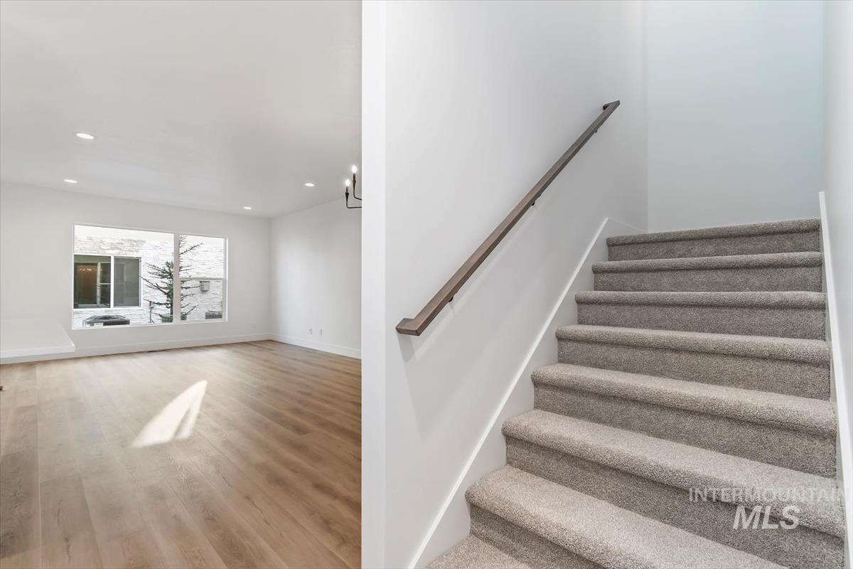 752 South Calhoun Place Star, ID 83669 - Photo 14 of 40 Staircase featuring recessed lighting and wood finished floors