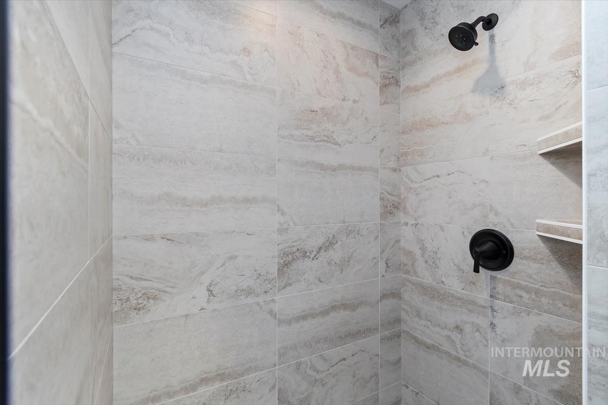 752 South Calhoun Place Star, ID 83669 - Photo 20 of 40 Bathroom view of a tile shower
