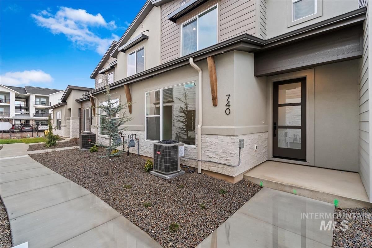 752 South Calhoun Place Star, ID 83669 - Photo 3 of 40 Entrance to property with stucco siding and stone siding