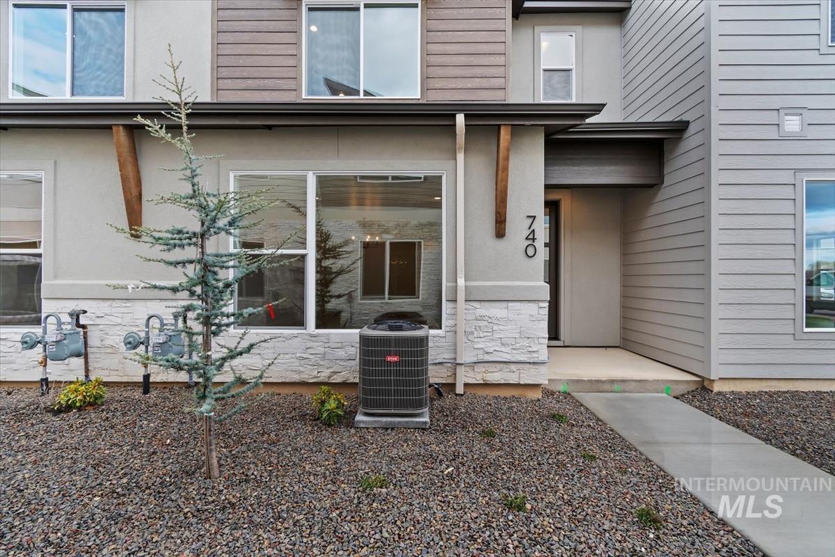 752 South Calhoun Place Star, ID 83669 - Photo 4 of 40 View of exterior entry with stucco siding