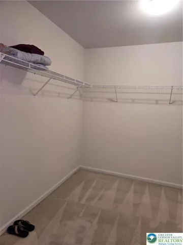 a view of a room with racks on the wall