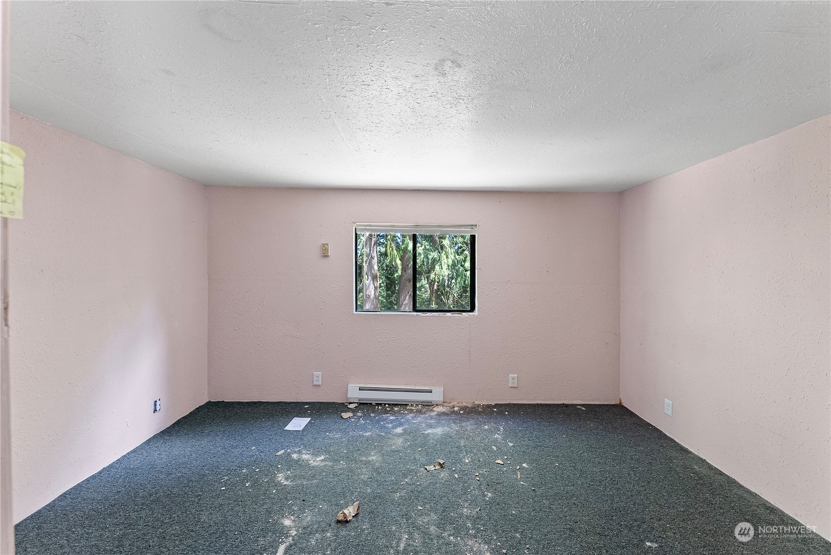 66 Peter Hagen Road Northwest Seabeck, WA 98380 - Photo 12 of 26 an empty room with windows