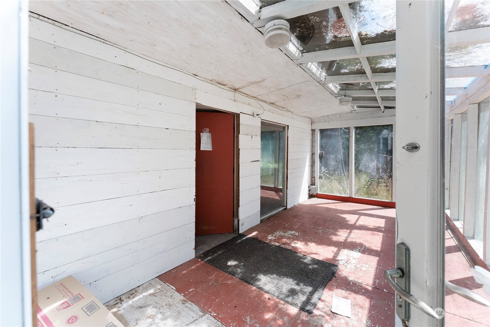 66 Peter Hagen Road Northwest Seabeck, WA 98380 - Photo 5 of 26 a view of front door of house