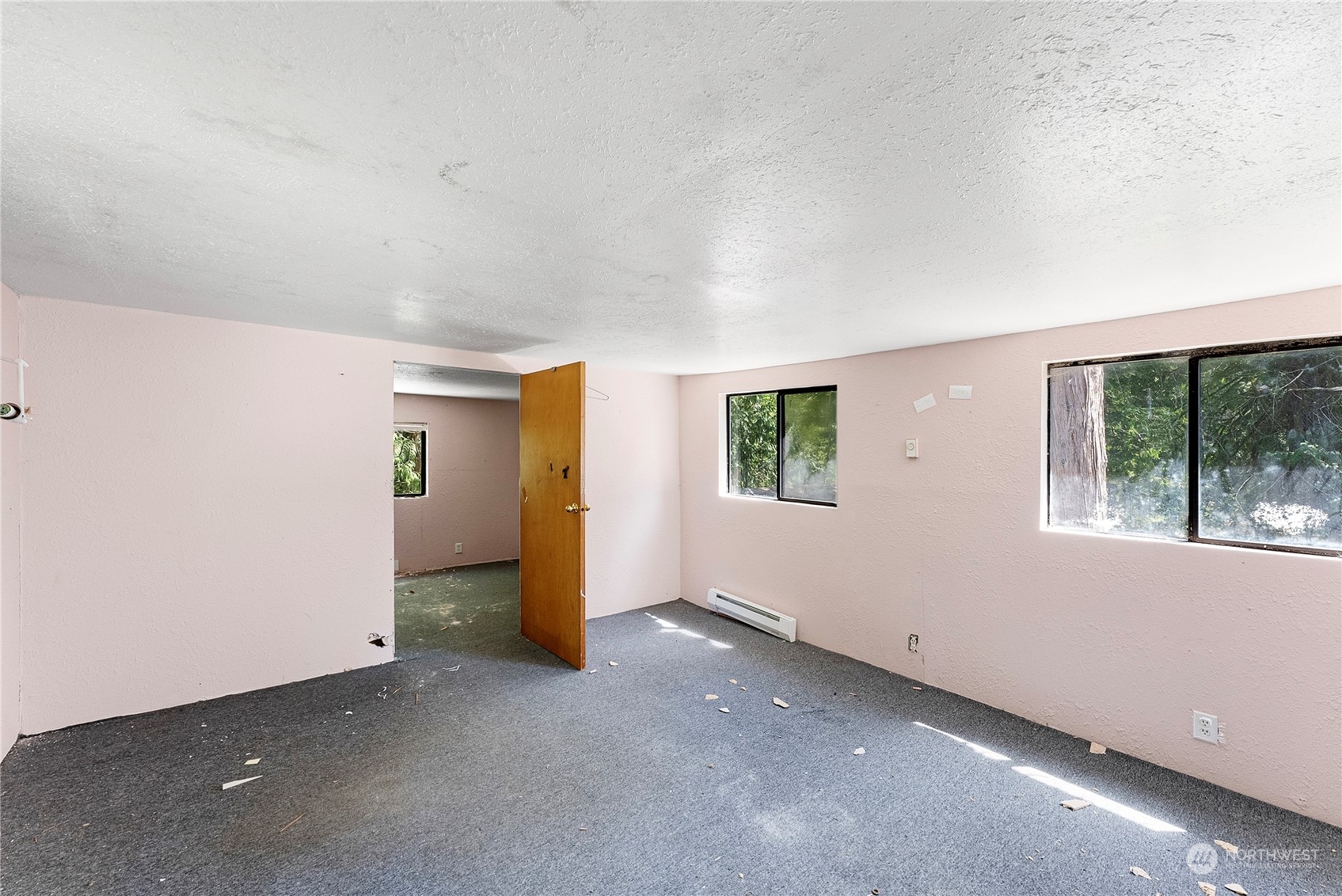 66 Peter Hagen Road Northwest Seabeck, WA 98380 - Photo 8 of 26 an empty room with windows