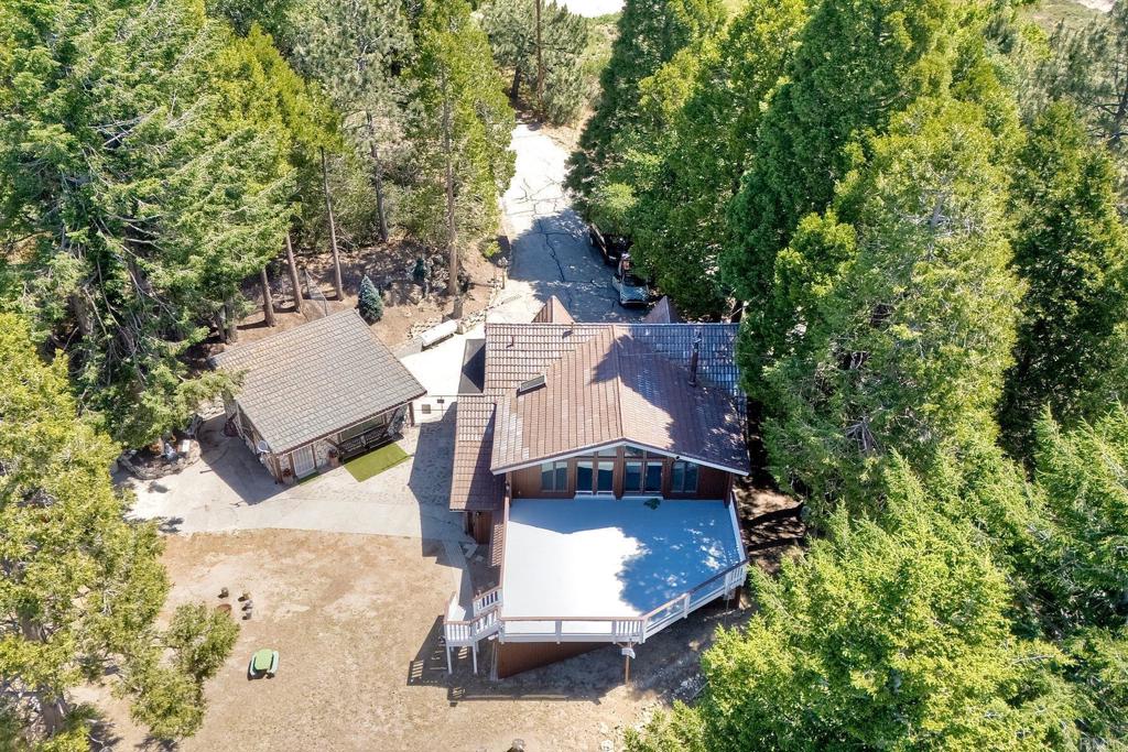 22223 Crestline Road Palomar Mountain, CA 92060 - Photo 83 of 90 an aerial view of a house with a yard and trees