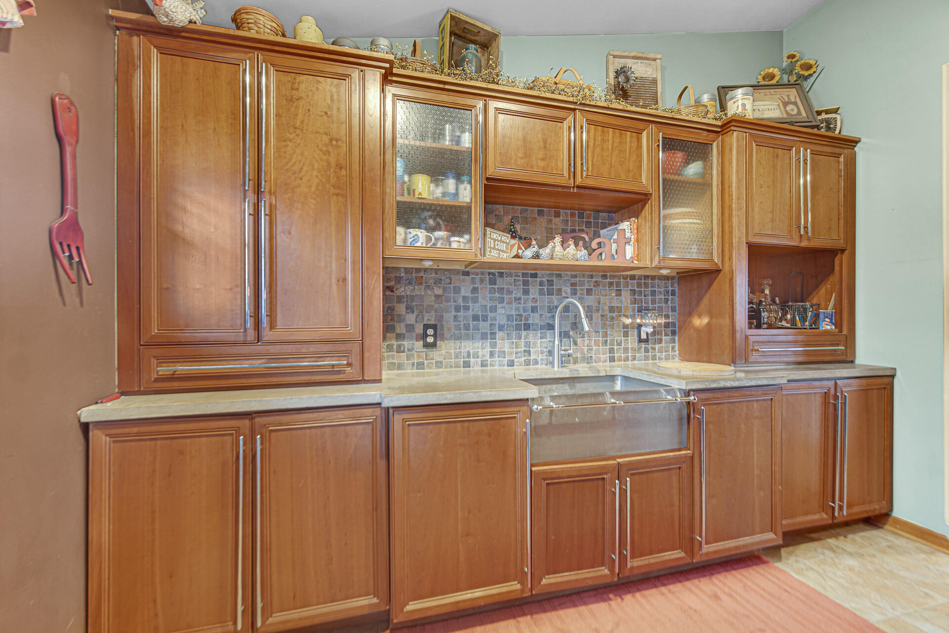 505 North Washington Street Hebron, IN 46341 - Photo 11 of 27 a kitchen with stainless steel appliances granite countertop a sink and cabinets