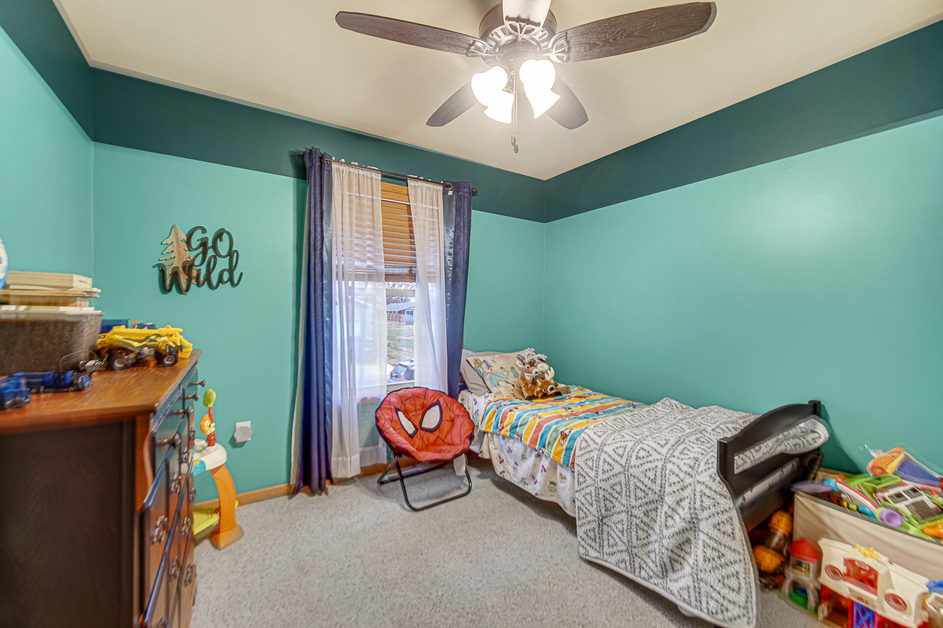 505 North Washington Street Hebron, IN 46341 - Photo 14 of 27 a bedroom with a bed and wooden floor
