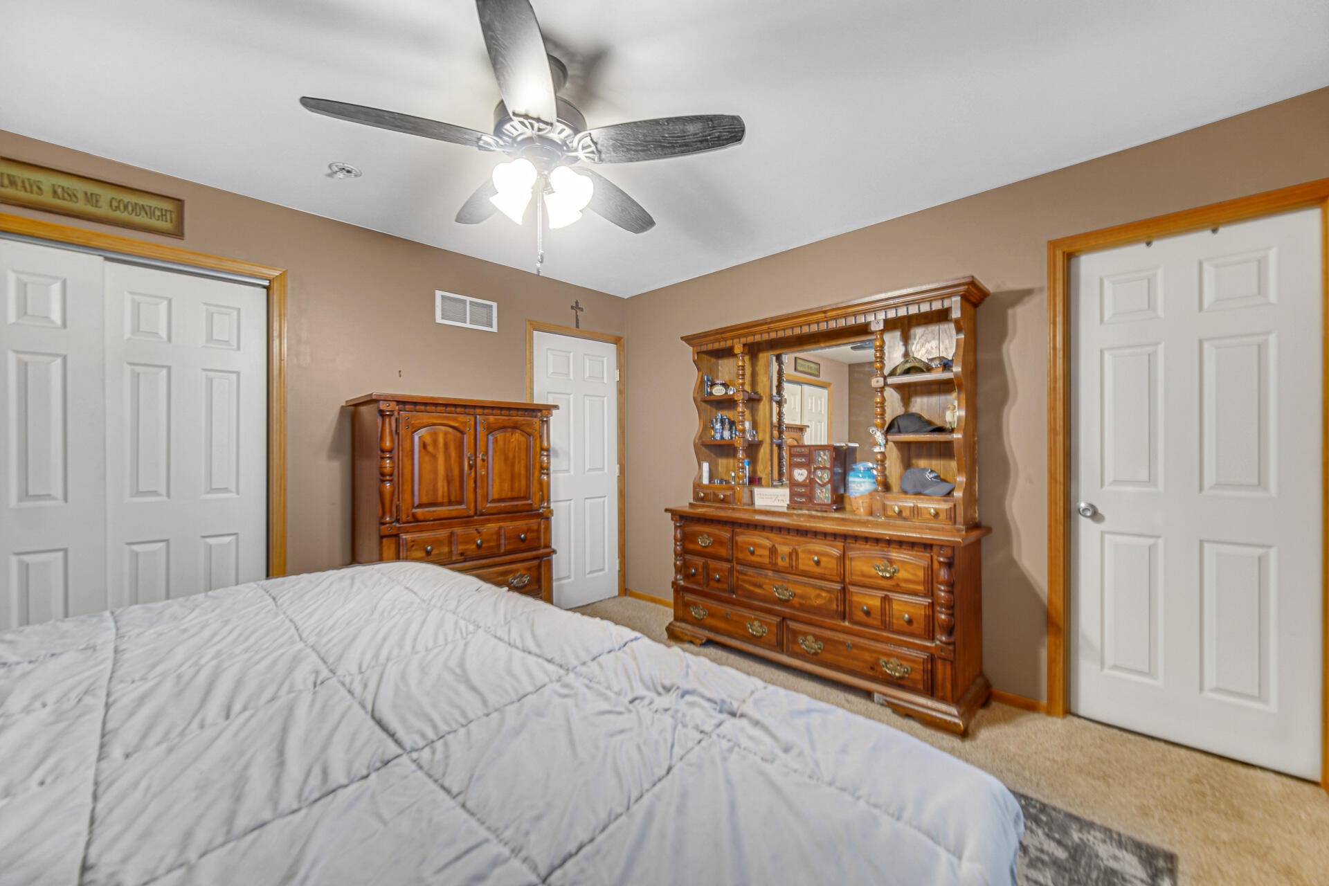505 North Washington Street Hebron, IN 46341 - Photo 18 of 27 a bedroom with a bed and a dresser