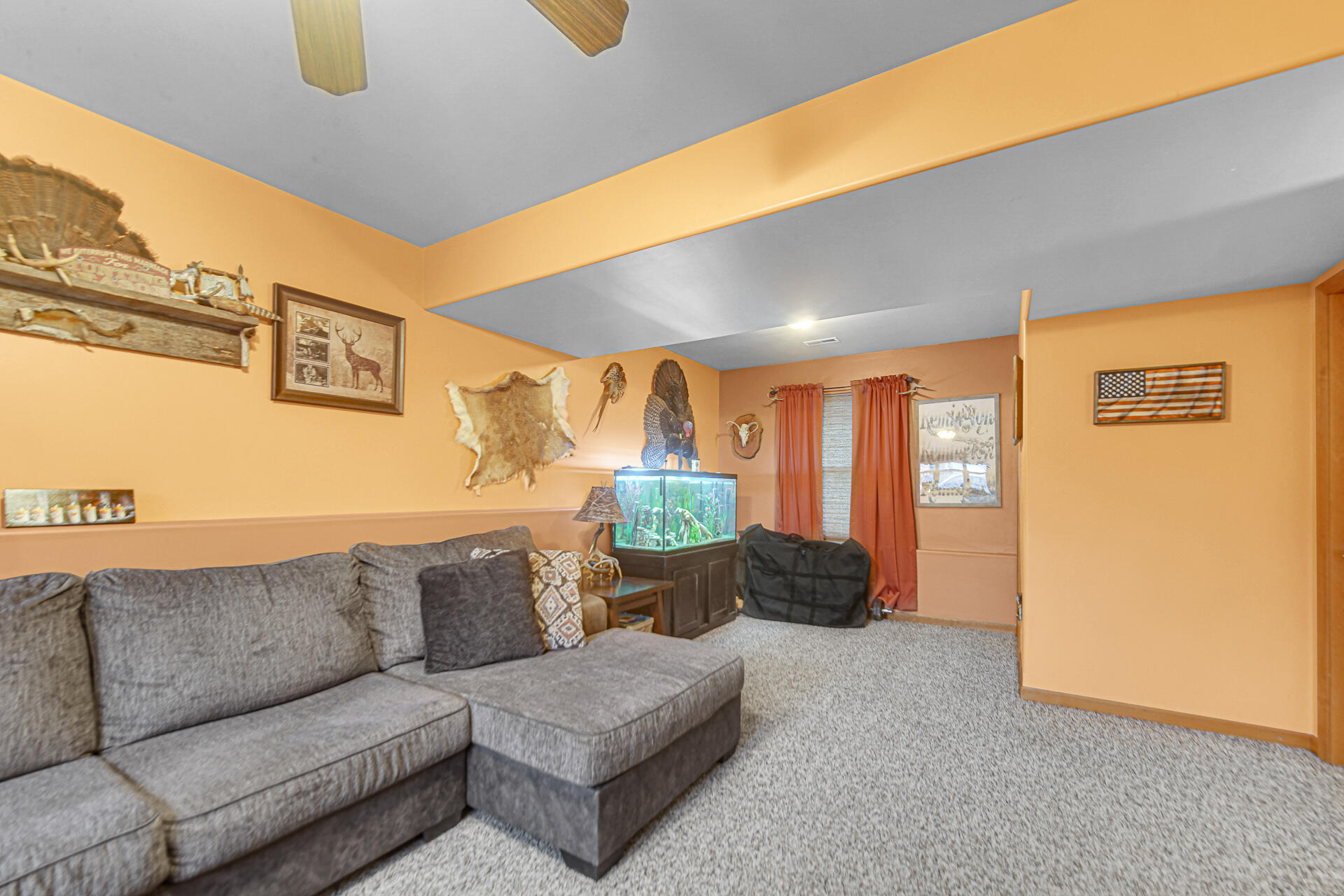 505 North Washington Street Hebron, IN 46341 - Photo 20 of 27 a living room with furniture and a chandelier