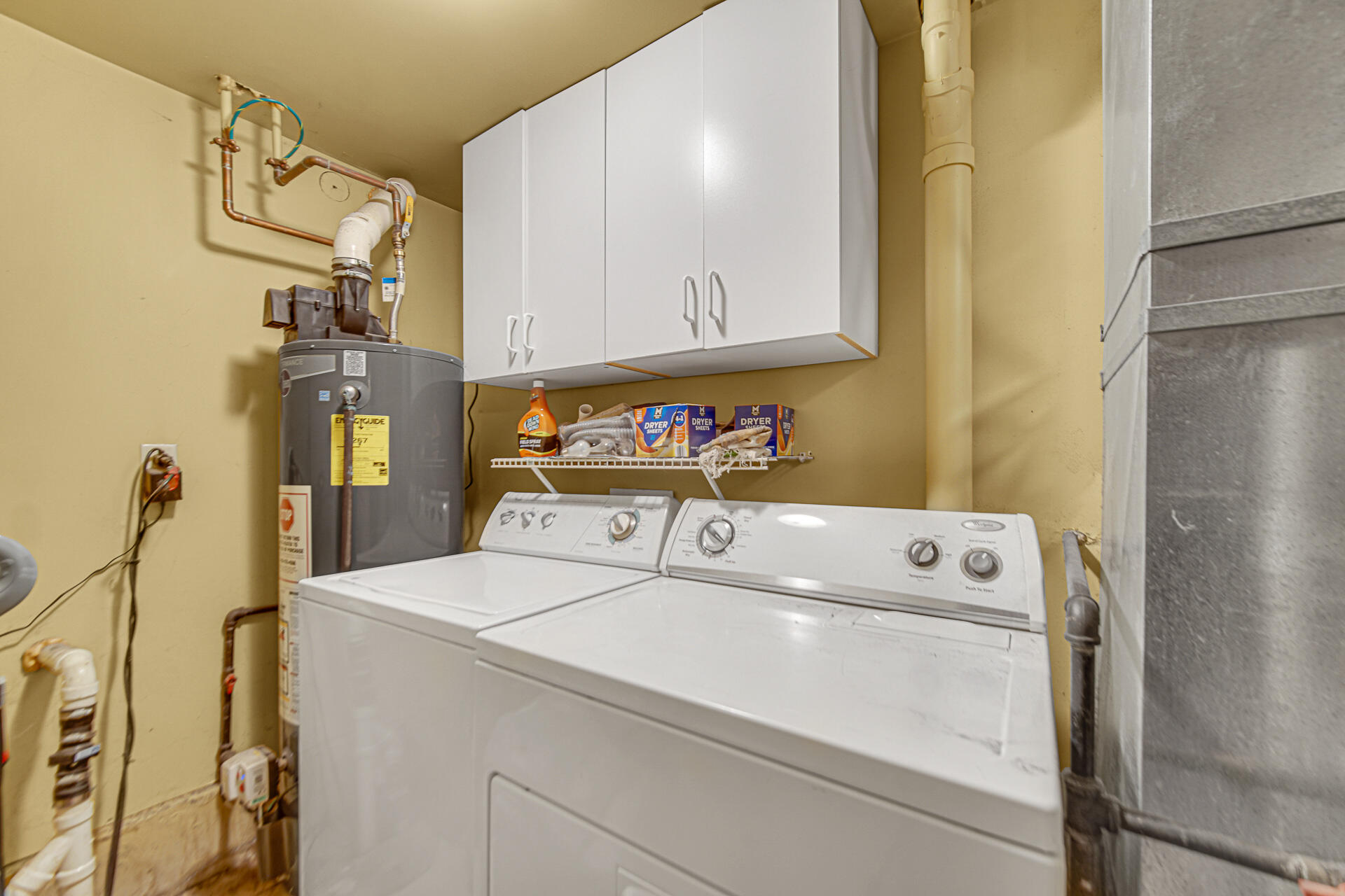 505 North Washington Street Hebron, IN 46341 - Photo 22 of 27 a utility room with dryer and washer