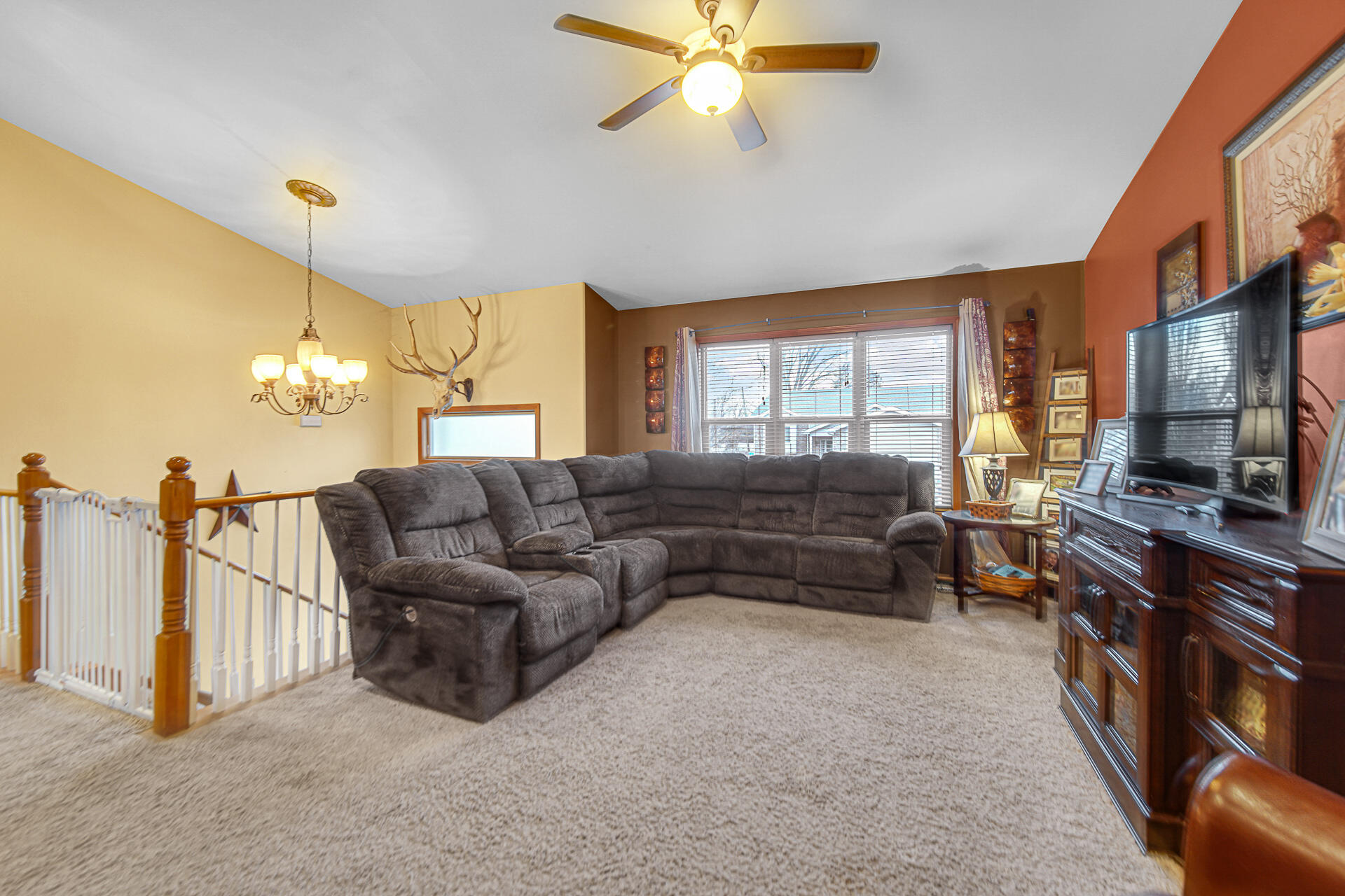 505 North Washington Street Hebron, IN 46341 - Photo 6 of 27 a living room with furniture a flat screen tv and a window