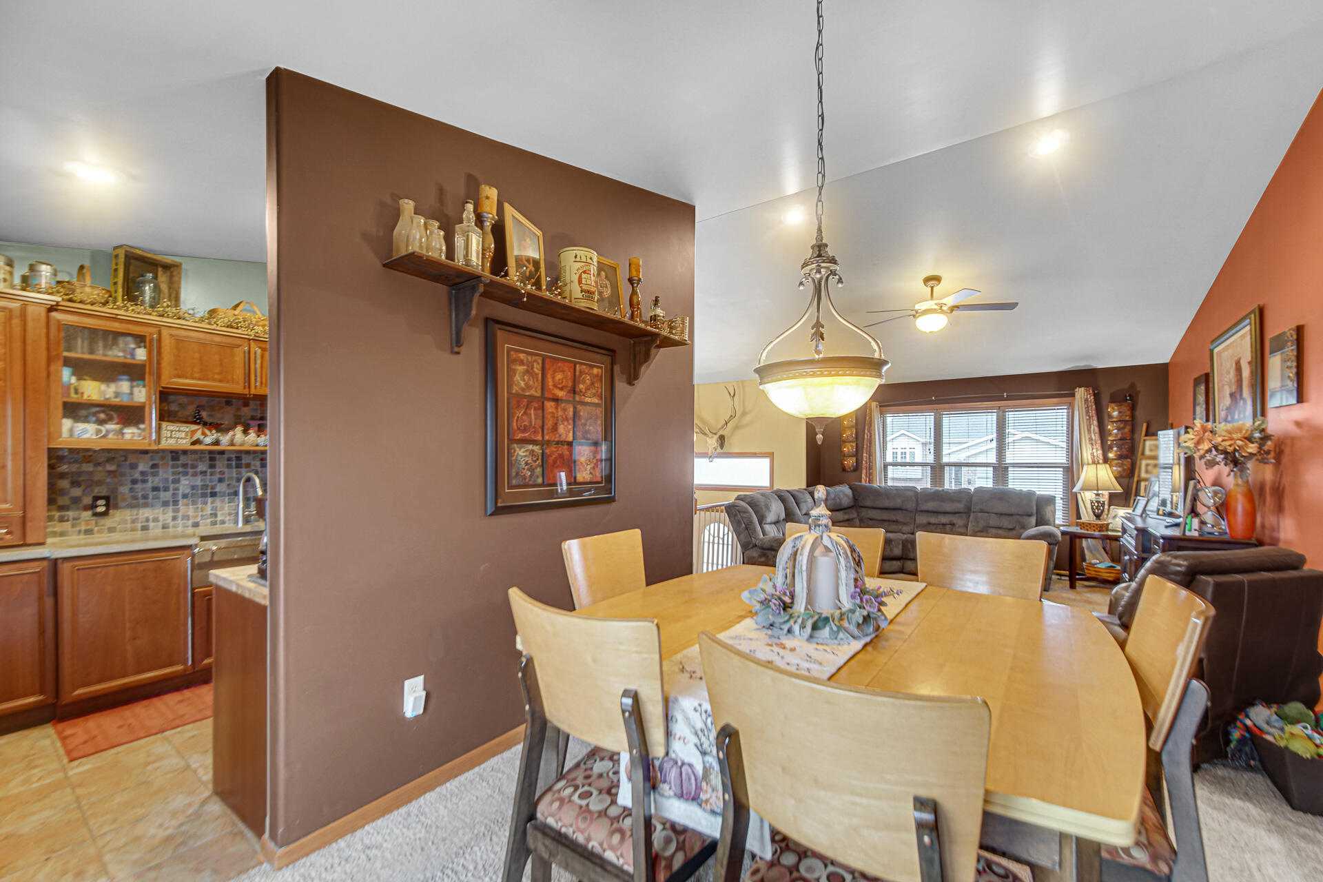 505 North Washington Street Hebron, IN 46341 - Photo 9 of 27 a view of a dining room with furniture and chandelier