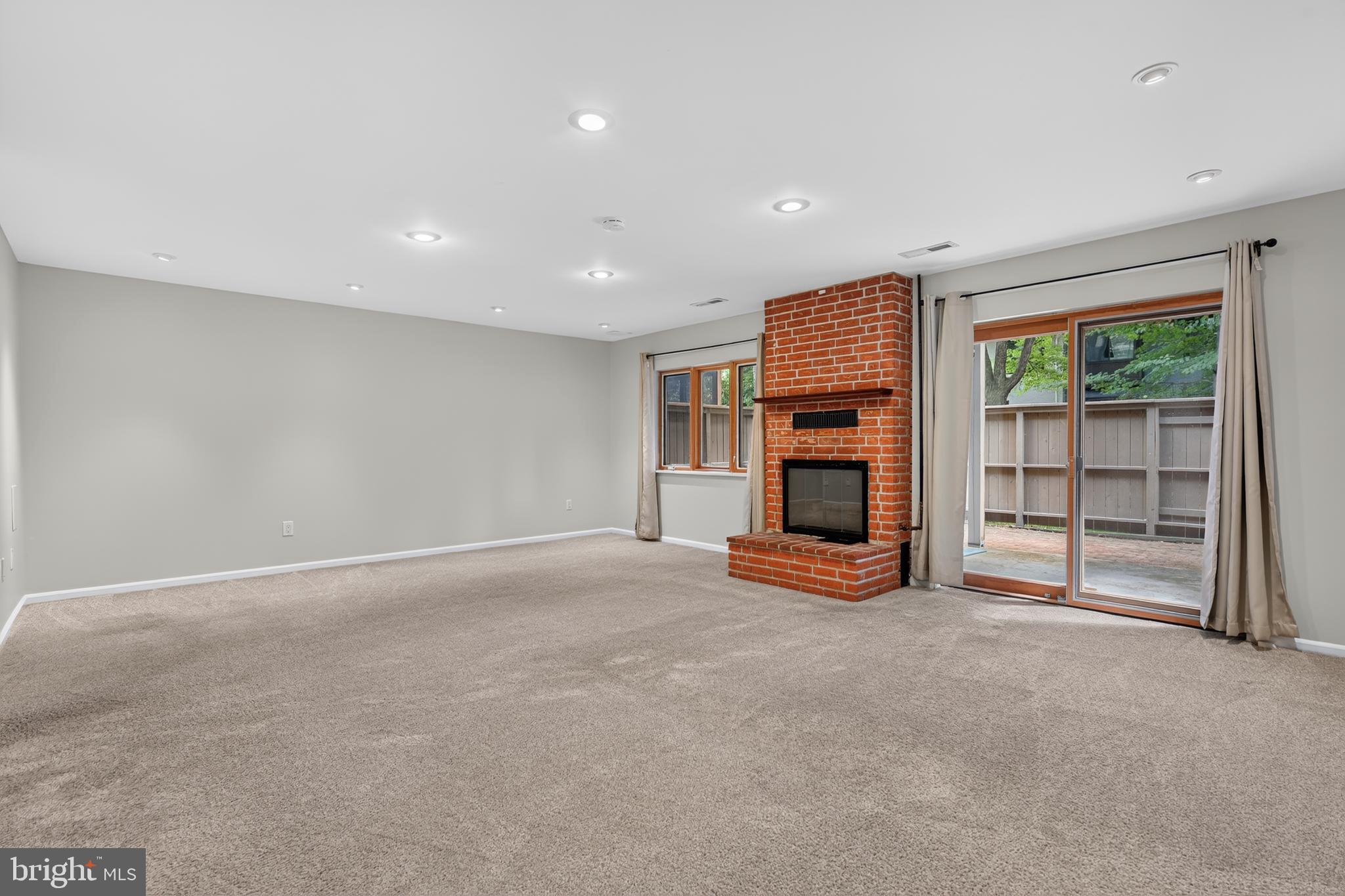 2031 Sarazen Place Reston, VA 20191 - Photo 20 of 27 Huge Rec Room Walks out to Full Fenced Backyard
