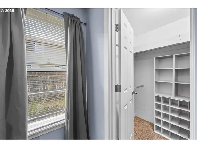a view of a living room and a window