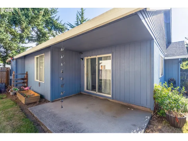 a backyard of a house with an outdoor space