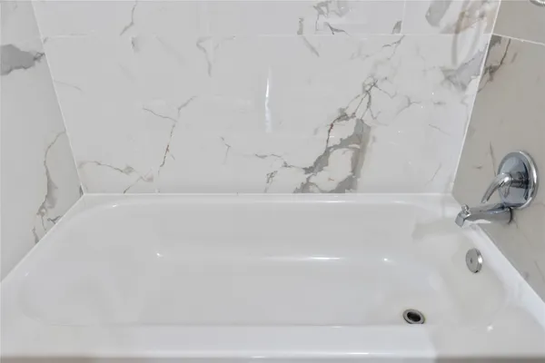 a bathroom with a bathtub