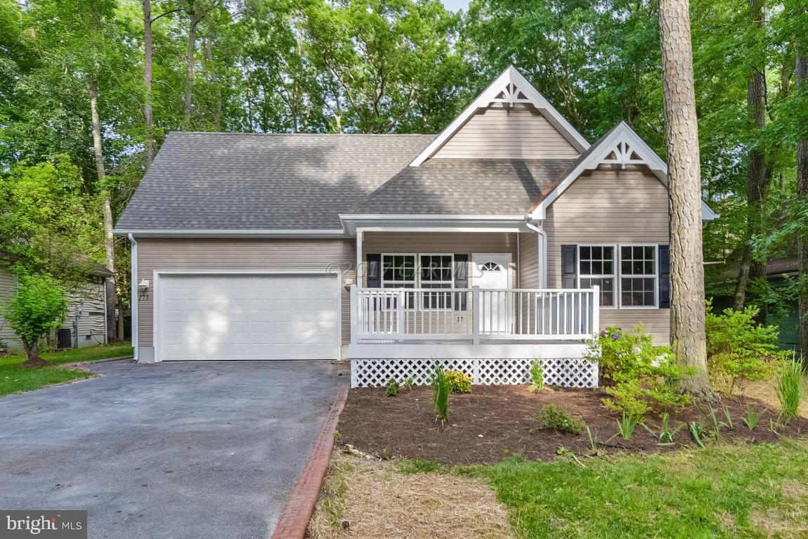 173 Sandyhook Road Ocean Pines, MD 21811 - Photo 1 of 40 front view of a house with a yard