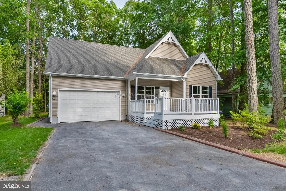 173 Sandyhook Road Ocean Pines, MD 21811 - Photo 2 of 40 front view of a house with a yard