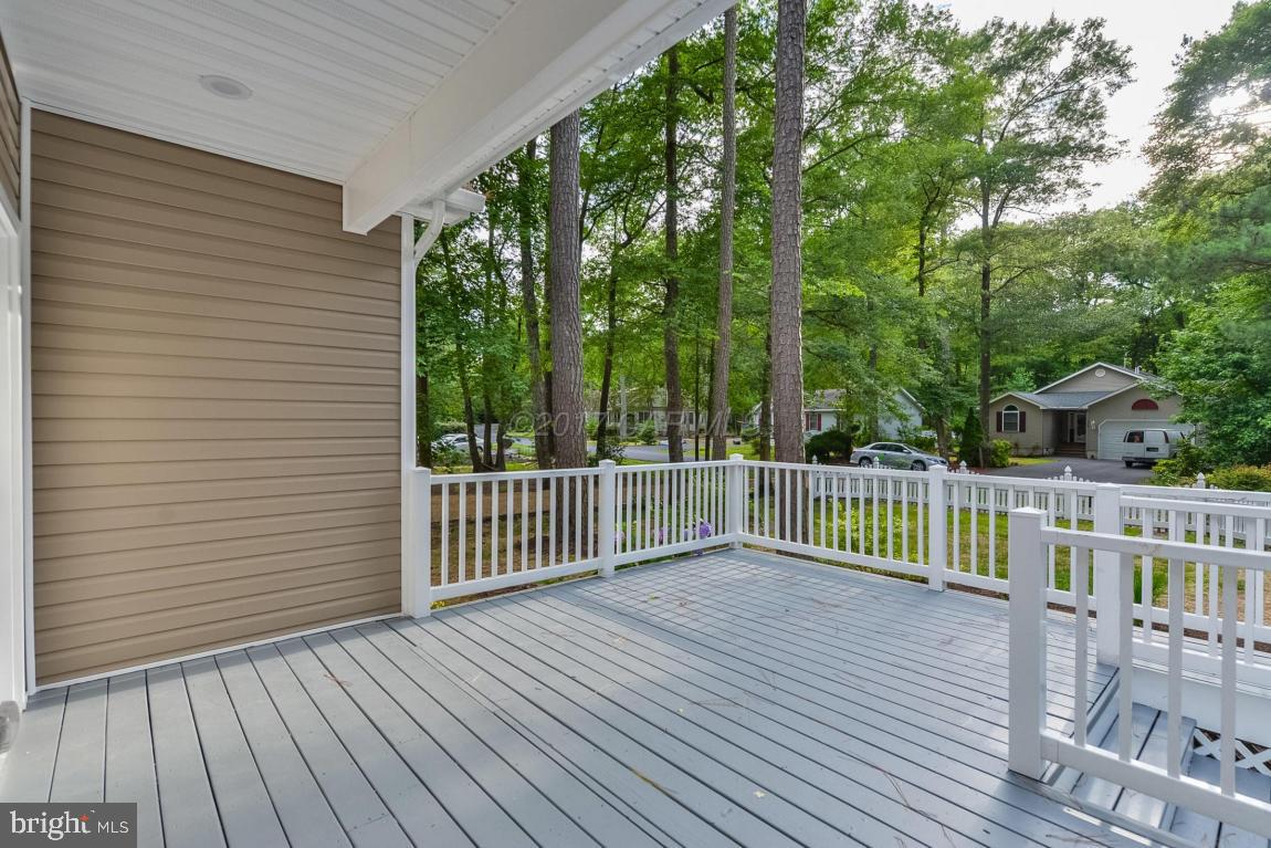 173 Sandyhook Road Ocean Pines, MD 21811 - Photo 19 of 40 a view of deck with wooden floor and fence