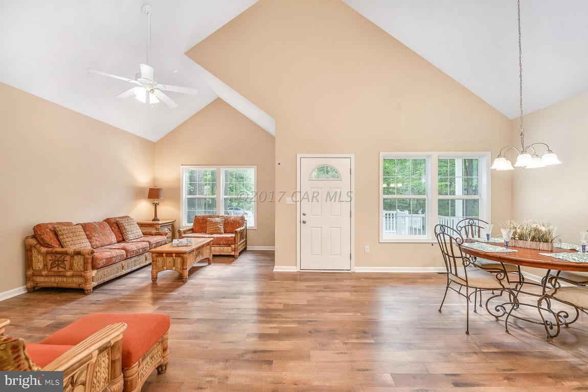 173 Sandyhook Road Ocean Pines, MD 21811 - Photo 21 of 40 a living room with furniture and a large window
