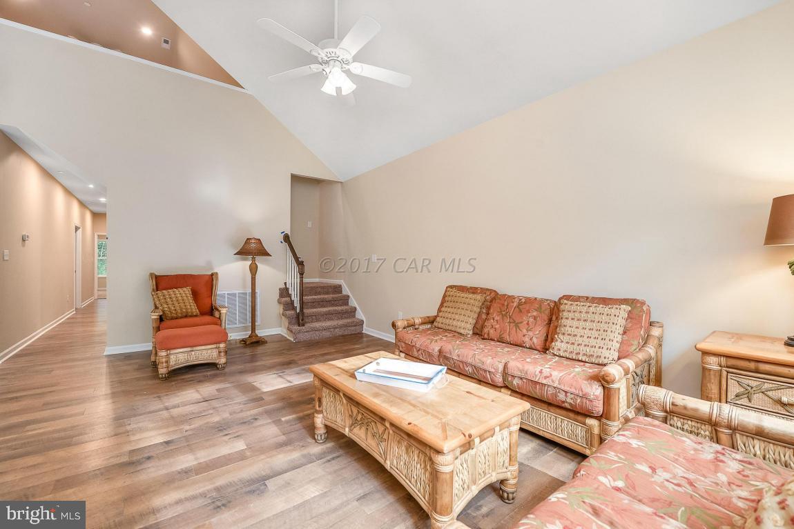 173 Sandyhook Road Ocean Pines, MD 21811 - Photo 24 of 40 a living room with furniture and a couch