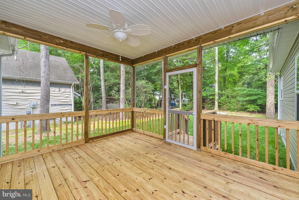 173 Sandyhook Road Ocean Pines, MD 21811 - Photo 35 of 40 a view of a balcony with wooden floor