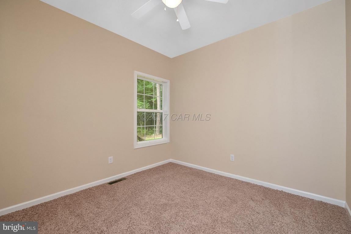 173 Sandyhook Road Ocean Pines, MD 21811 - Photo 39 of 40 an empty room with a window