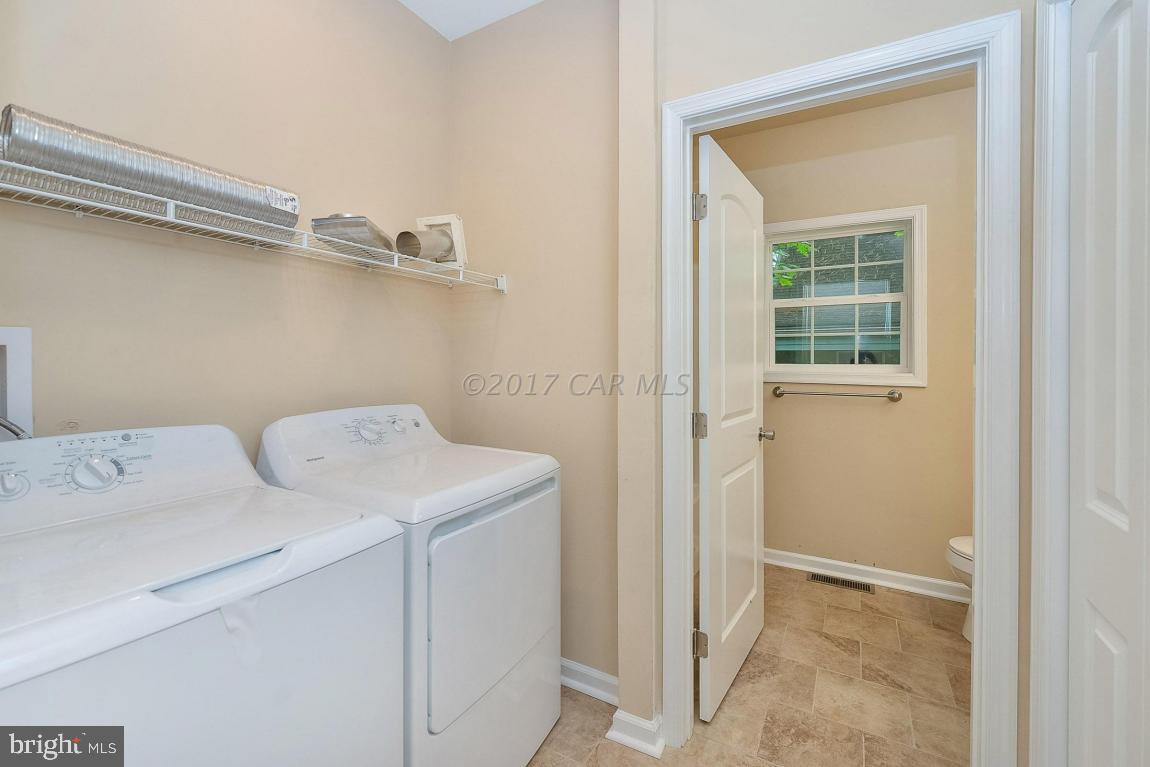 173 Sandyhook Road Ocean Pines, MD 21811 - Photo 8 of 40 a utility room with dryer and washer