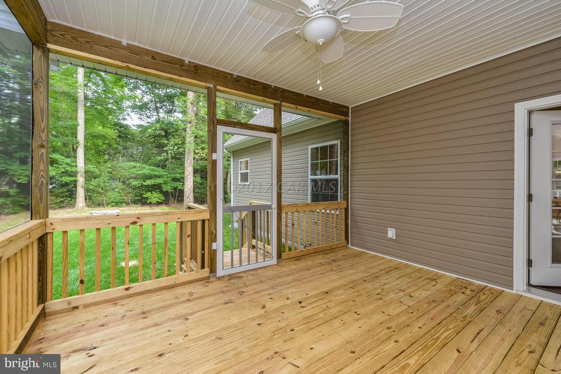 173 Sandyhook Road Ocean Pines, MD 21811 - Photo 9 of 40 a view of an empty room with a window