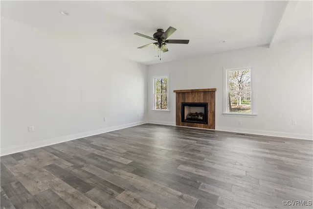 a view of a kitchen with a sink and cabinets