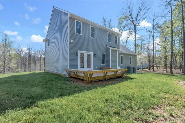 a backyard of a house with barbeque oven
