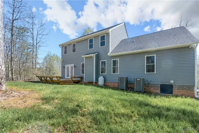 a view of backyard with green space