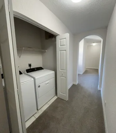 an empty room with a bathroom
