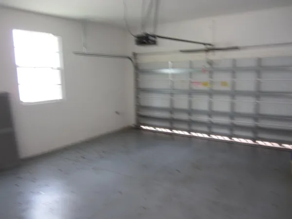 a view of a house with swimming pool and porch