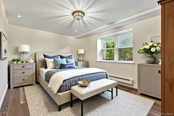 a spacious bedroom with a bed and a window