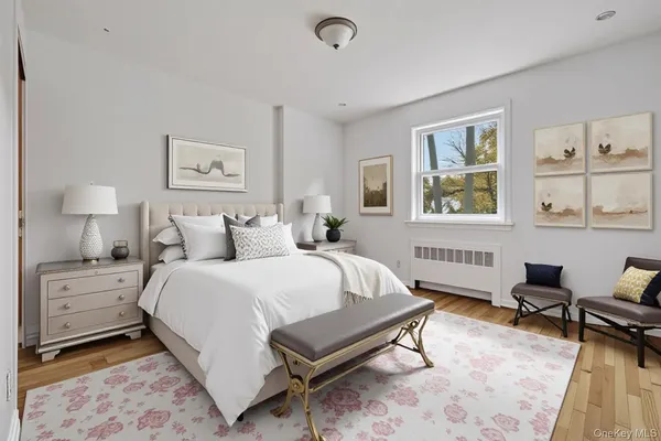 a bed room with a bed and a chair