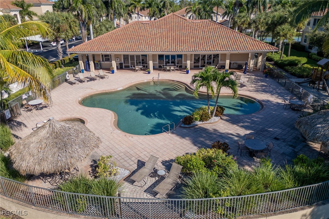 14981 Reflection Key Circle, Unit 335 Fort Myers, FL 33907 - Photo 32 of 42 an aerial view of a house